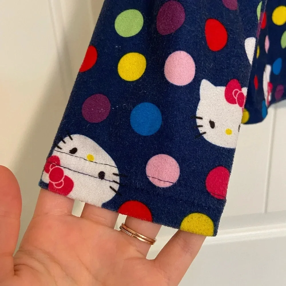 Hello Kitty girl’s polka dot print button up pajama shirt — size‎ 7/8
